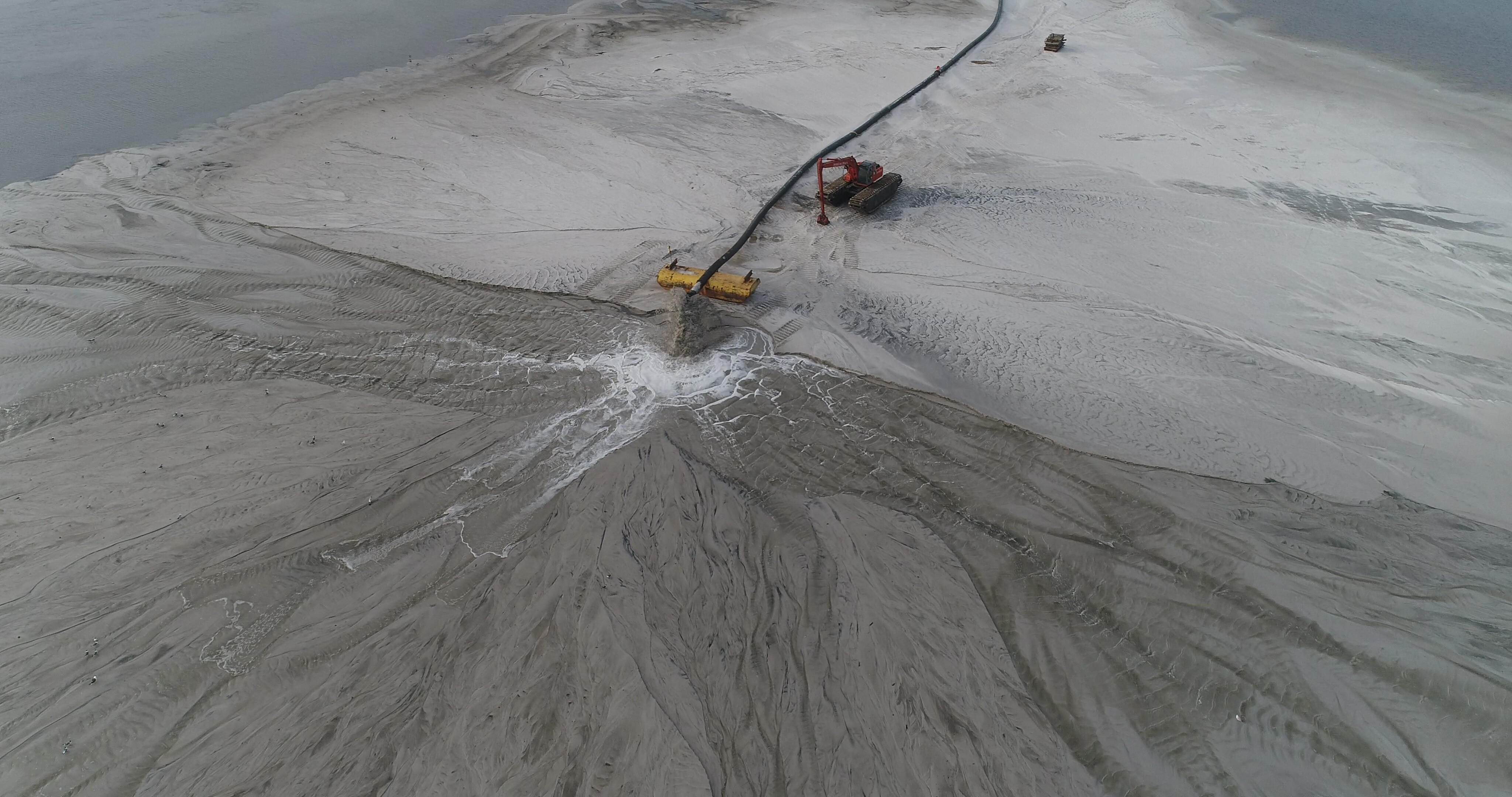 Pumping of AIWW dredge material to create a bird island at the Cumberland Dividings maintenance dredging project in Camden County, Georgia (credit: Devon Carlock/Cottrell Contracting Corporation).